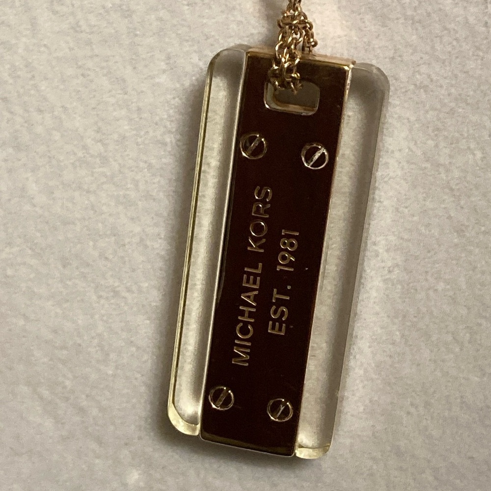 Michael Kors rose gold long tag pendant